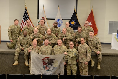 Approximately 20 Illinois Army National Guard soldiers with the Bilateral Embedded Staff Team (BEST) A11 were recognized during a Freedom Salute Ceremony at Camp Lincoln in Springfield, Ill., March 22, 2014. The BEST A11 soldiers deployed to Afghanistan and returned home December 2013. (U.S. Army National Guard photo by Sgt. 1st Class Kassidy L. Snyder/Released)