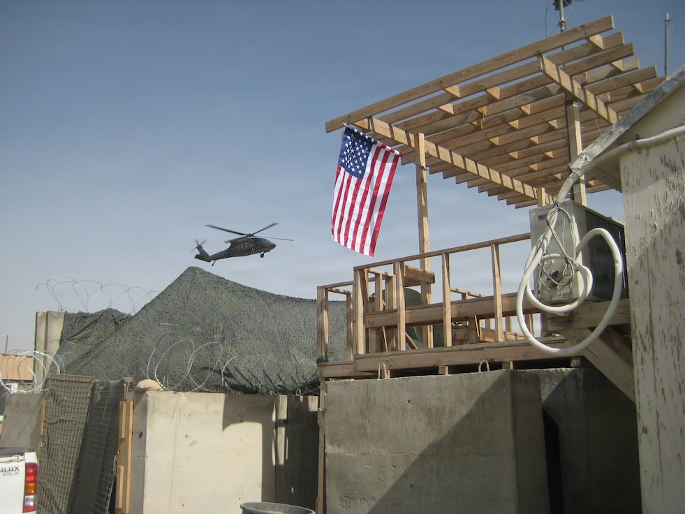 A Blackhawk helicopter provides aerial support above Forward Operating Base Ghazni, Afghanistan. August 28 marks the 13th anniversary of a Taliban attack on the base on which 16 members of the Illinois Army National Guard’s Bilateral Embedded Staff Team A-11 were deployed alongside Polish Land Forces.