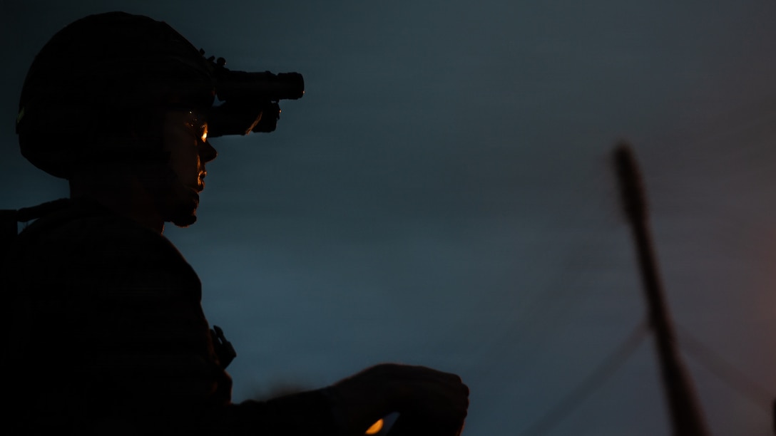 U.S. Marine Corps Lance Cpl. Roberto Garcia, a rifleman with 12th Littoral Combat Team, 12th Marine Littoral Regiment, 3d Marine Division, sets security during a combat trauma management course evaluation on Camp Courtney, Okinawa, Japan, Aug. 27, 2026.