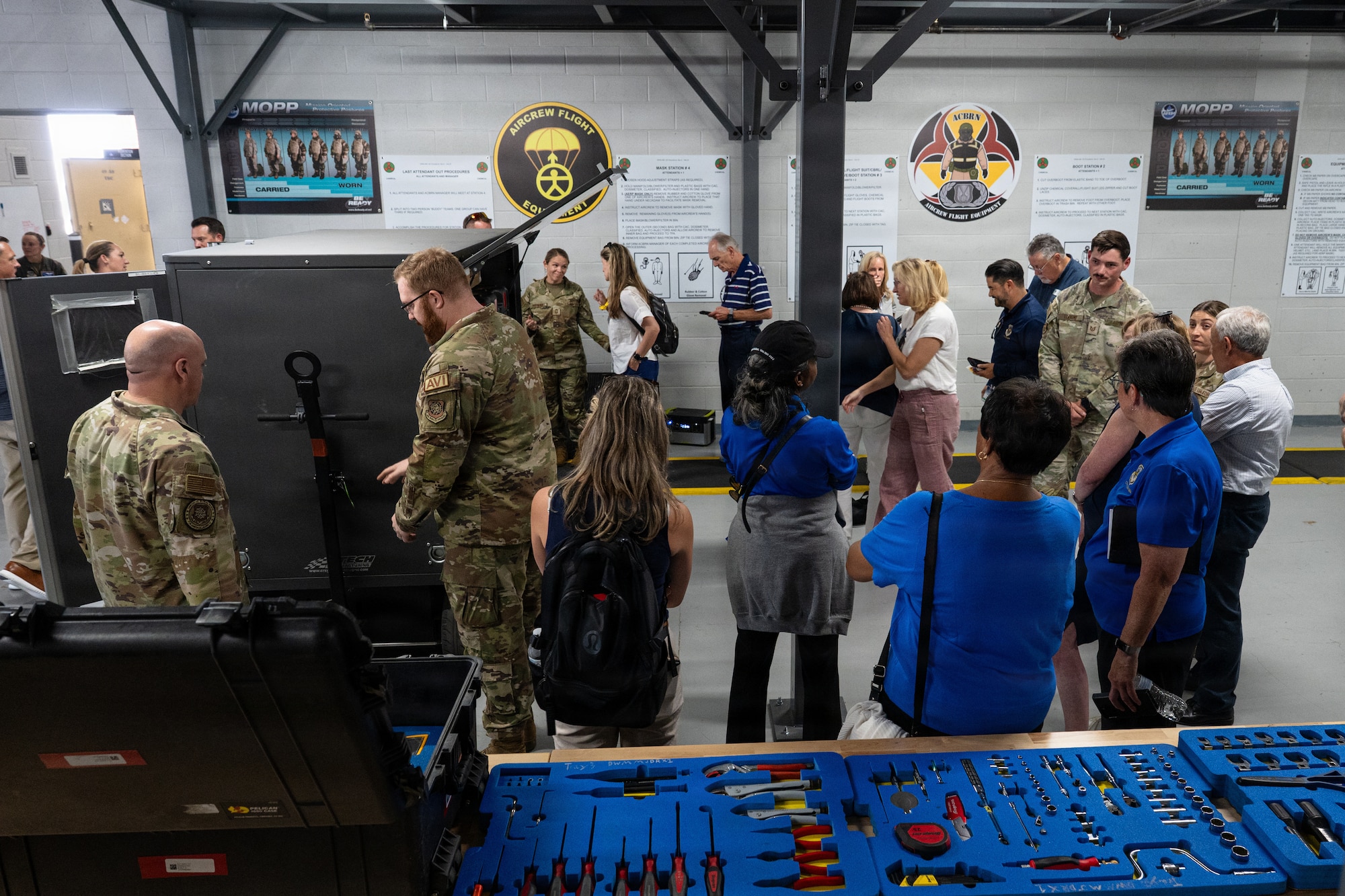U.S. Air Force Tech. Sgt. Tyler Nelson, 317th Aircraft Maintenance Squadron flying crew chief, answers questions about the Rapid Expeditionary Toolkit during an Air Mobility Command civic leader tour at Dyess Air Force Base, Texas, Aug. 25, 2026. The mobile maintenance workshop enables 317th Airlift Wing maintainers to rapidly deploy the tools and equipment needed to sustain C-130J Super Hercules operations from dispersed or austere locations. (U.S. Air Force photo by Senior Airman Jade M. Caldwell)
