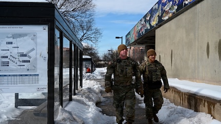 U.S. Army Capt. Jonathon Davis and U.S. Army Spc. Drew Pathammavong, assigned to the Georgia National Guard, conduct a presence patrol in the Anacostia neighborhood during the D.C. Safe and Beautiful mission in Washington, D.C., Jan. 26, 2026. The team assumed responsibility for the area following the transition of Florida National Guard forces supporting the mission. About 2,500 National Guard members support the D.C. Safe and Beautiful mission, assisting the Metropolitan Police Department in maintaining public safety for residents, commuters and visitors throughout the District. (U.S. Air National Guard video by Tech. Sgt. Renee Crugnale)