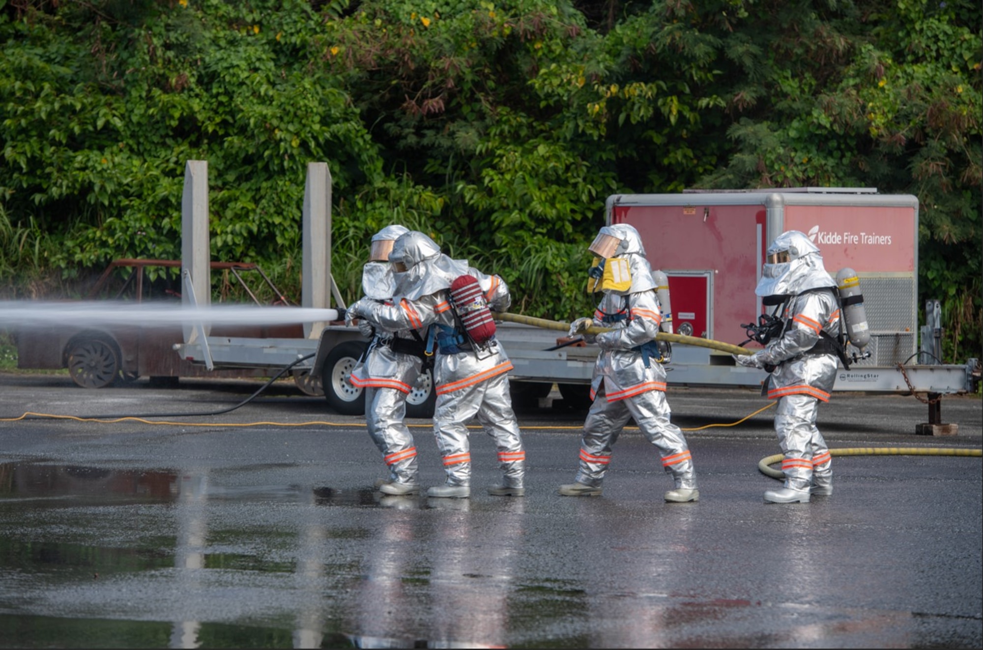 Service members participate in training.