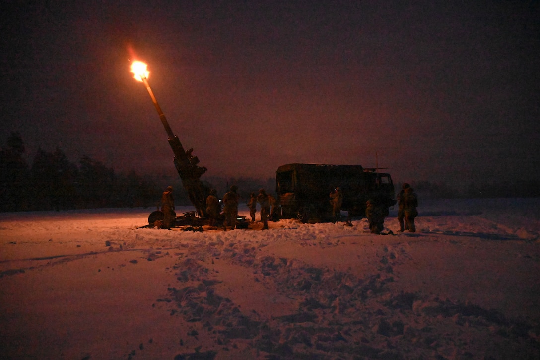 U.S. Soldiers assigned to 4th Battalion, 319th Airborne Field Artillery Regiment, 173rd Airborne Brigade, fire M777 Howitzers during a live-fire exercise as part of Dynamic Front 26 at 7th Army Training Command's Grafenwoehr Training Area, Jan. 29, 2026. Dynamic Front is the practical application of the Eastern Flank Deterrence Line that enhances US and NATO's capability to coordinate lethal and non-lethal effects in a distributed battlefield. (U.S. Army photo by Spc. Francisco Torres)