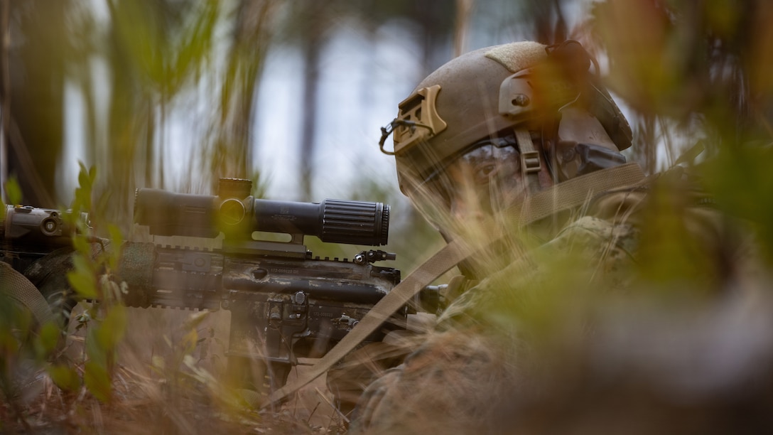 U.S. Marine Corps Cpl. Reilly Hurn, an infantry rifleman with 3rd Battalion, 2nd Marine Regiment, 24th Marine Expeditionary Unit, holds security during a live-fire range on Marine Corps Base Camp Lejeune, North Carolina, Jan. 14, 2026. The range increases Marines lethality through live fire movements and combat scenarios. The 24th MEU is a Marine Air Ground Task Force ready to answer our Nation's call in any clime and place. (U.S. Marine Corps photo by Lance Cpl. Brian Bolin Jr.)