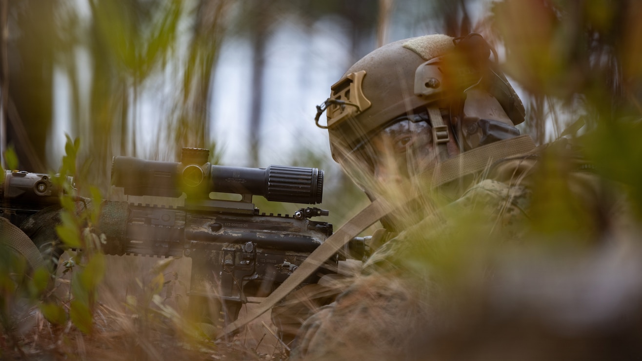 U.S. Marine Corps Cpl. Reilly Hurn, an infantry rifleman with 3rd Battalion, 2nd Marine Regiment, 24th Marine Expeditionary Unit, holds security during a live-fire range on Marine Corps Base Camp Lejeune, North Carolina.