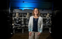 DAHLGREN, Va. — Karen Wingeart, division head for the Maritime Warfare Control Systems Division at Naval Surface Warfare Center Dahlgren Division, stands in a high bay facility used for combat systems testing. Wingeart leads efforts that support the development, integration and readiness of U.S. Navy warfighting capabilities.(Morgan Tabor/NSWCDD Photo)