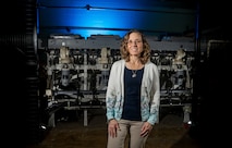 DAHLGREN, Va. — Karen Wingeart, division head for the Maritime Warfare Control Systems Division at Naval Surface Warfare Center Dahlgren Division, stands in a high bay facility used for combat systems testing. Wingeart leads efforts that support the development, integration and readiness of U.S. Navy warfighting capabilities.(Morgan Tabor/NSWCDD Photo)