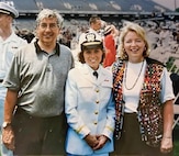 ANNAPOLIS, Md. — Karen Wingeart (center) stands with her parents at the U.S. Naval Academy following her graduation and commissioning as a U.S. Navy ensign on May 24, 1996.