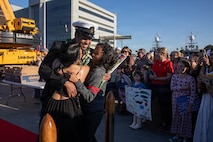 NAVAL BASE POINT LOMA, Calif. (Jan. 30, 2026) - A Sailor assigned to Los Angeles-class fast-attack submarine USS Greeneville (SSN 772) is welcomed home after returning to Naval Base Point Loma following a deployment to the U.S. Indo-Pacific Command area of responsibility, Jan. 30, 2026. Greeneville is assigned to Commander, Submarine Squadron 11, home to four Los Angeles-class fast-attack submarines, which are capable of supporting various missions, including anti-submarine warfare, anti-ship warfare, strike warfare and intelligence, surveillance and reconnaissance. (U.S. Navy photo by Mass Communication Specialist 2nd Class Rashan Jefferson)
