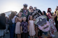 NAVAL BASE POINT LOMA, Calif. (Jan. 30, 2026) - A Sailor assigned to Los Angeles-class fast-attack submarine USS Greeneville (SSN 772) is welcomed home after returning to Naval Base Point Loma following a deployment to the U.S. Indo-Pacific Command area of responsibility, Jan. 30, 2026. Greeneville is assigned to Commander, Submarine Squadron 11, home to four Los Angeles-class fast-attack submarines, which are capable of supporting various missions, including anti-submarine warfare, anti-ship warfare, strike warfare and intelligence, surveillance and reconnaissance. (U.S. Navy photo by Mass Communication Specialist 2nd Class Rashan Jefferson)