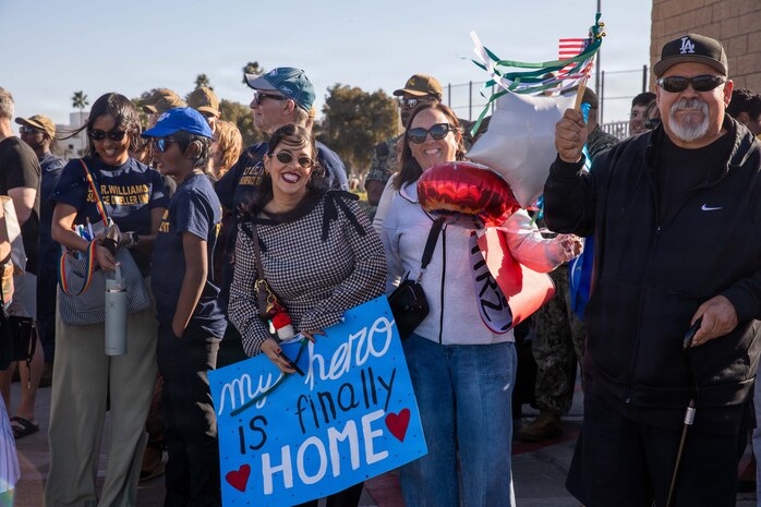 NAVAL BASE POINT LOMA - Families celebrate as Los Angeles-class fast-attack submarine USS Greeneville (SSN 772) returns to Naval Base Point Loma following a deployment to the U.S. Indo-Pacific Command area of responsibility, Jan. 30, 2026. Greeneville is assigned to Commander, Submarine Squadron 11, home to four Los Angeles-class fast-attack submarines, which are capable of supporting various missions, including anti-submarine warfare, anti-ship warfare, strike warfare and intelligence, surveillance and reconnaissance. (U.S. Navy photo by Mass Communication Specialist 2nd Class Rashan Jefferson)