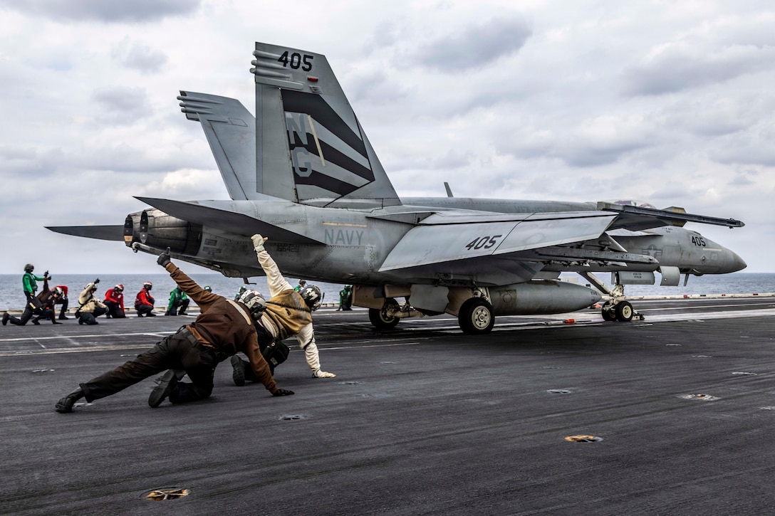 ARABIAN SEA (Jan. 28, 2026) An F/A-18E Super Hornet, attached to Strike Fighter Squadron (VFA) 151, launches from the flight deck of Nimitz-class aircraft carrier USS Abraham Lincoln (CVN 72) in the Arabian Sea, Jan. 28. Abraham Lincoln is deployed to the U.S. 5th Fleet area of operations to support maritime security and stability in the CENTCOM area of responsibility. (U.S. Navy photo by Mass Communication Specialist Seaman Zoe Simpson)