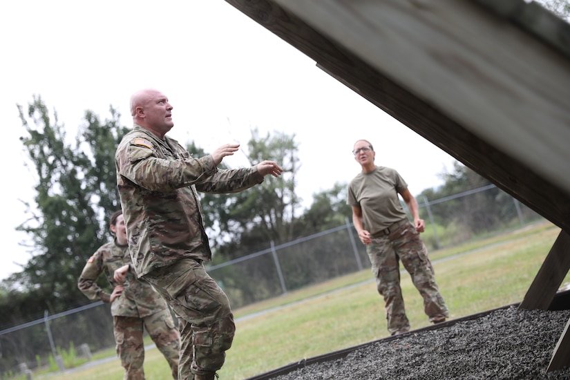 U.S. Army Spc. Brennan Glenn, a public affairs specialist with the 109th Mobile Public Affairs Detachment, 213th Regional Support Group, completes an obstacle course during the unit’s annual training period, July 16, 2022 at Fort Indiantown Gap, Pennsylvania