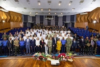 Participants and official party of Cutlass Express 2026 (CE 26) stand for a group photo during the opening ceremony at the Mauritius Police Band Headquarters.