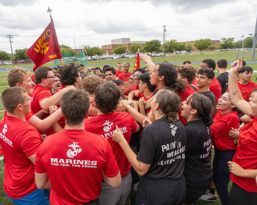 U.S. Marine Corps Poolees and guests with Recruit Sub-station Waterbury, Recruiting Station (RS) Springfield, celebrate their victory during the annual pool function at East Haven High School, East Haven, Connecticut, May 31, 2025. The annual pool function is held every year at RS Springfield to prepare poolees for the rigors of recruit training. (U.S. Marine Corps photo by Sgt. Hernan Rodriguez)