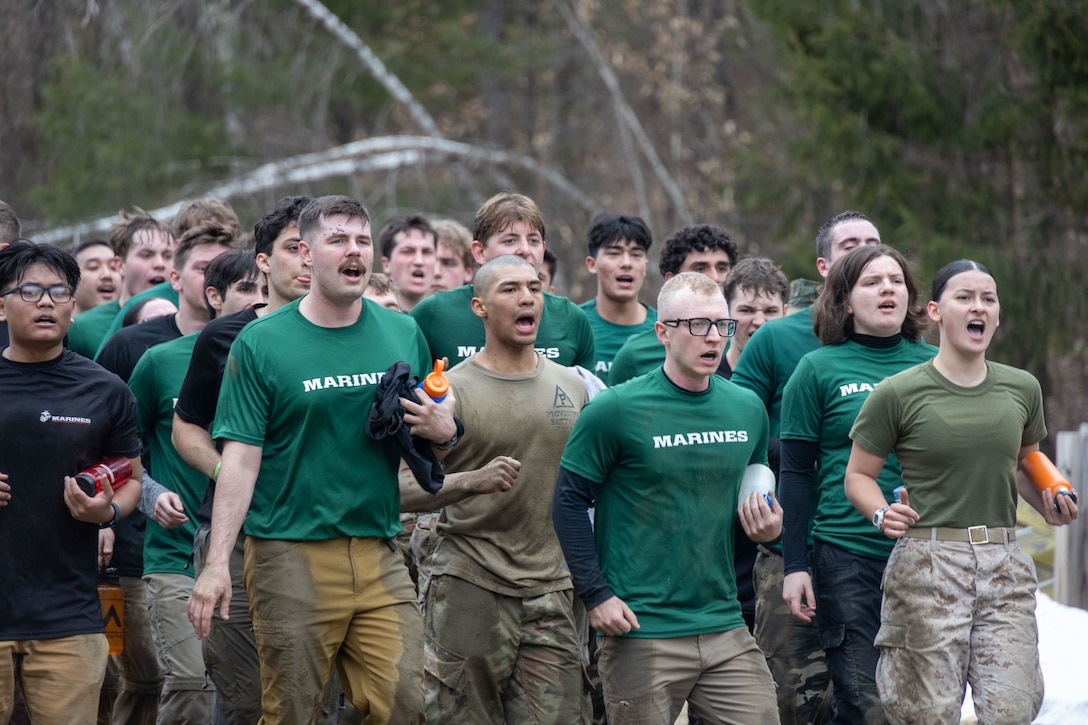 U.S. Marine Corps officer candidates with 1st Marine Corps District run in place during Mini-Officer Candidate School (OCS) at Norwich University, Northfield, Vermont, April 4, 2025. Mini-OCS provides applicants and candidates a glimpse into Officer Candidate School by placing them through an intense training environment designed to test their endurance, resiliency, and courage. (U.S. Marine Corps photo by Sgt. Hernan Rodriguez)