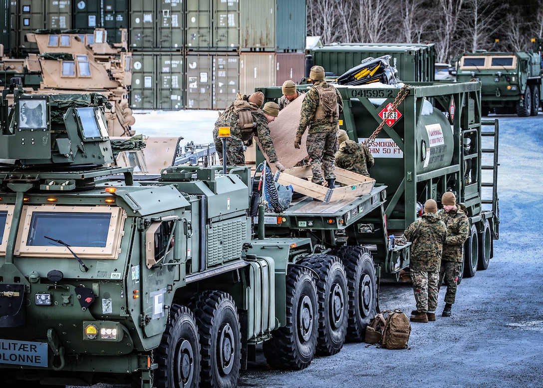 U.S. Marines prepare prepositioned motor transport equipment at a Marine Corps Prepositioning Program–Norway cave site Jan. 22, 2026, in Norway, ahead of convoy operations supporting exercise Cold Response 26. The preparation supports safe, coordinated movement and timely employment of equipment issued to II Marine Expeditionary Force Marines. (U.S. Marine Corps photo by Cpl. Nicholas Martinez)