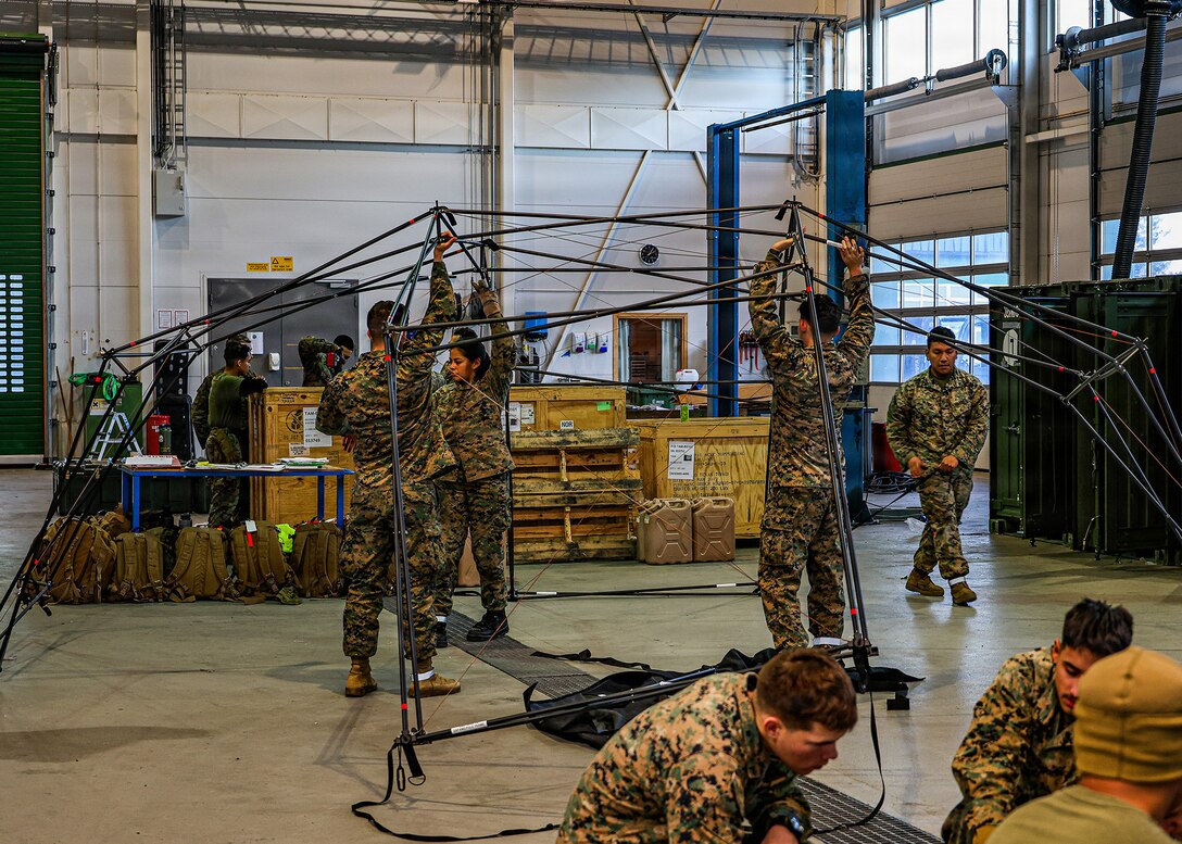 U.S. Marines with 2nd Distribution Support Battalion inspect, prepare and inventory prepositioned equipment and conduct joint limited technical inspections at Marine Corps Prepositioning Program–Norway cave sites Jan. 22, 2026, in Norway, prior to issuance in support of exercise Cold Response 26. These actions ensure equipment readiness and accountability before transfer to II Marine Expeditionary Force Marines. (U.S. Marine Corps photo by Cpl. Nicholas Martinez)