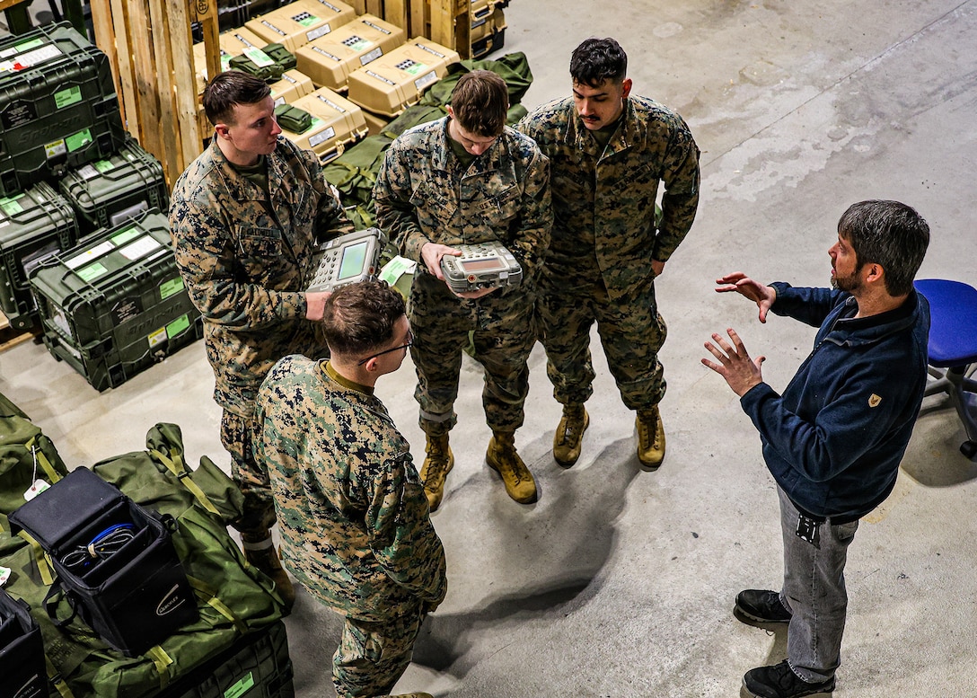 U.S. Marines receive instruction on joint limited technical inspection procedures for prepositioned equipment at Marine Corps Prepositioning Program–Norway cave sites Jan. 19, 2026, in Norway, in support of exercise Cold Response 26. The instruction prepares Marines to conduct inspections that ensure equipment readiness prior to issuance to II Marine Expeditionary Force Marines. (U.S. Marine Corps photo by Cpl. Nicholas Martinez)
