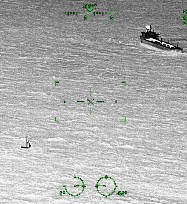 The crew of motor tanker Radiant Pride arrives on scene with three mariners aboard a 44-foot sailing vessel taking on water, 450 miles east of Daytona Beach, Feb. 1, 2026. Pride's crew arrived on scene after a Coast Guard Air Station Elizabeth City HC-130 Hercules aircrew issued a distress radio broadcast requesting assistance for the rescue. (U.S. Coast Guard photo courtesy of Air Station Elizabeth City HC-130 aircrew)
