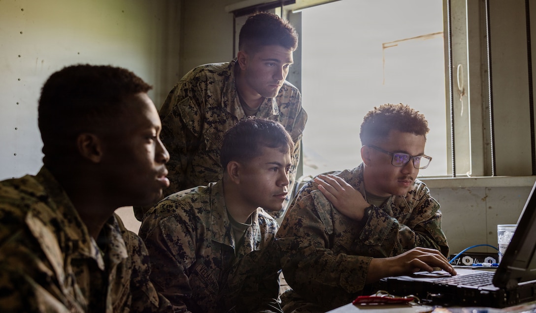 U.S. Marines assigned to 9th Communication Battalion, I Marine Expeditionary Force Information Group, set up satellite communications during a sustainment exercise at Marine Corps Base Camp Pendleton, California, Jan. 28, 2026.  This training opportunity allows 9th Comm Bn. Marines to build confidence and proficiency in mission-essential tasks, such as establishing network connectivity and services and refining command and control procedures for higher headquarters. (U.S. Marine Corps photo by Cpl. Peyton Kahle)