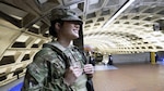 Spc. Lily Castro, an Alabama National Guard Soldier assigned to Joint Task Force–District of Columbia, pauses in a Metro station in Washington, Jan. 9, 2026. Castro supports the D.C. Safe and Beautiful mission, operating alongside local and federal law enforcement partners to promote coordination, public safety and confidence across the National Capital Region.
(U.S. Air National Guard photo by Master Sgt. William Blankenship)