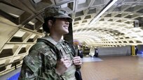 Spc. Lily Castro, an Alabama National Guard Soldier assigned to Joint Task Force–District of Columbia, pauses in a Metro station in Washington, Jan. 9, 2026. Castro supports the D.C. Safe and Beautiful mission, operating alongside local and federal law enforcement partners to promote coordination, public safety and confidence across the National Capital Region.
(U.S. Air National Guard photo by Master Sgt. William Blankenship)