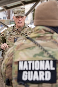 U.S. Army Brig. Gen. Leland D. Blanchard II, interim commanding general of the District of Columbia National Guard, visits with Soldiers and Airmen supporting the D.C. Safe and Beautiful mission in Washington, D.C., Jan. 31, 2026. As the senior leader of the D.C. National Guard, Blanchard provides command oversight and guidance to National Guard forces supporting public safety and interagency coordination across the capital. His visit reinforced the importance of disciplined presence, partnership with local and federal agencies, and sustained readiness in support of the mission. (U.S. Air National Guard photo by Master Sgt. William Blankenship)