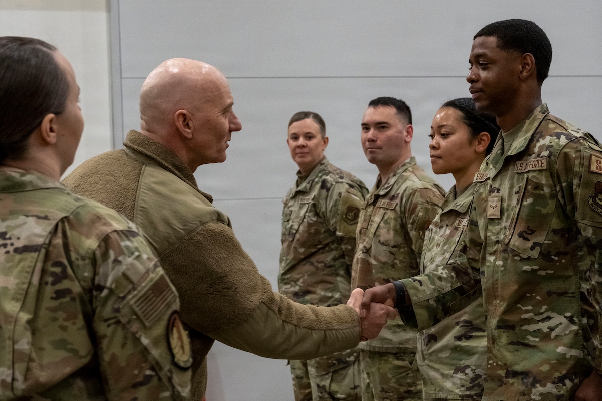 U.S. Air Force Maj. Gen. Donald Carpenter, F-35 fleet readiness and sustainment director, left, visits Airmen assigned to the 35th Logistics Readiness Squadron materiel management flight at Misawa Air Base, Japan, Jan. 28, 2026.