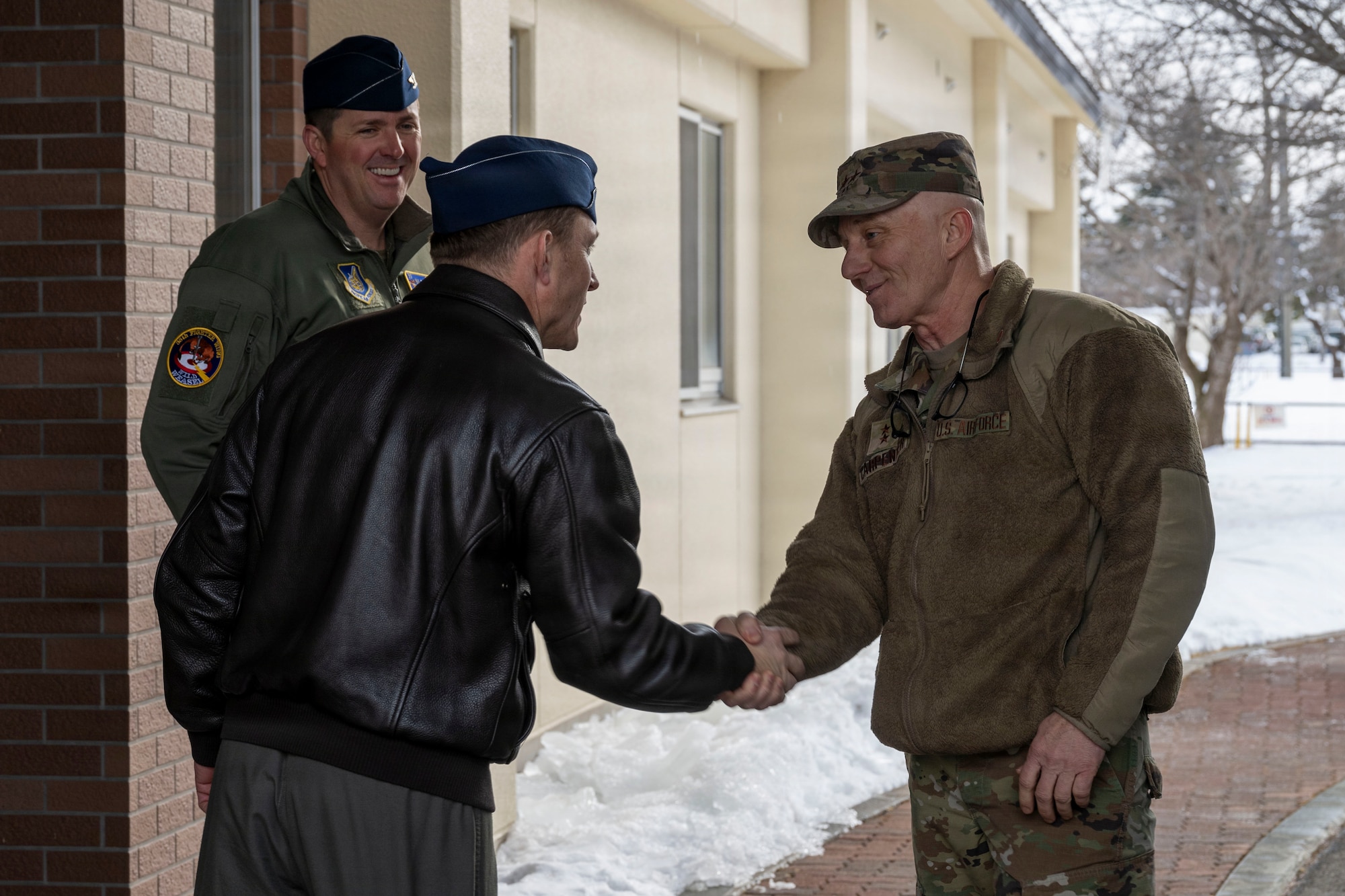 U.S. Air Force Maj. Gen. Donald Carpenter, F-35 fleet readiness and sustainment director, right, meets with Col. Paul Davidson, 35th Fighter Wing (FW) commander, and Col. Matthew Hoyt, 35th FW deputy commander, at Misawa Air Base, Japan, Jan. 28, 2026.