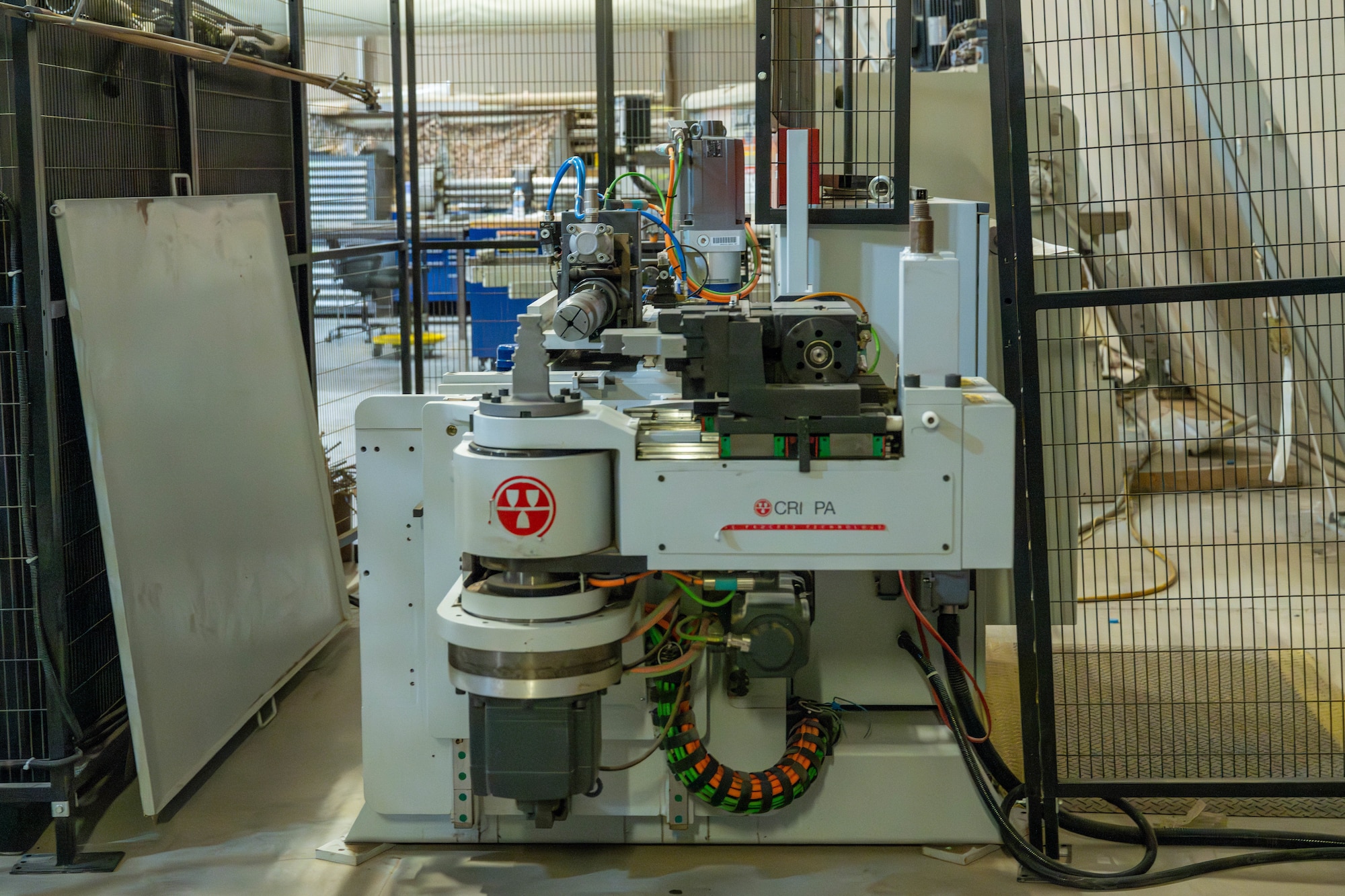 Crippa machine bends a hydraulic tube used throughout F-15E Strike Eagle aircraft in the U.S. Central Command area of responsibility, Jan. 28, 2026. The automated system streamlines tube fabrication for aircraft maintenance operations. (U.S. Air Force photo by Senior Airman Kari Degraffenreed)