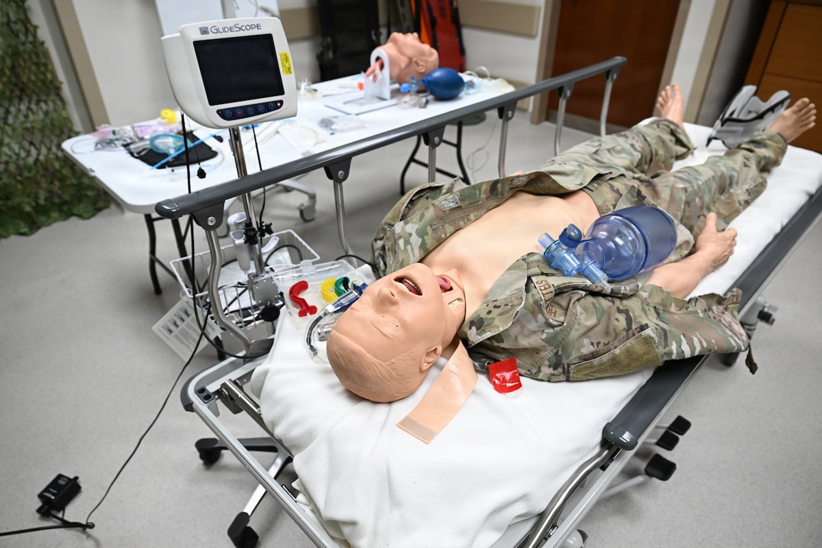 Training mannequin on a bed