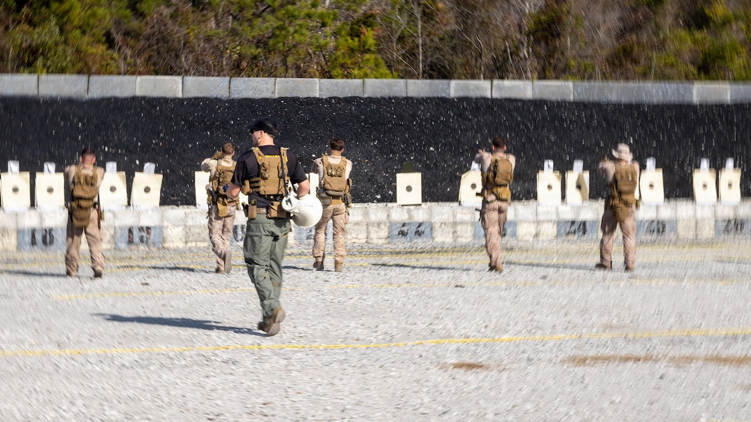 U.S. Marines with Reconnaissance Platoon and Combat Logistics Battalion 8, 24th Marine Expeditionary Unit, conduct rifle and pistol drills on Marine Corps Base Camp Lejeune, North Carolina, Jan. 8, 2026. The 24th MEU is a Marine Air-Ground Task Force ready to answer the nation's call in any clime and place. (U.S. Marine Corps photo by Cpl. Daniel R. Garcia)