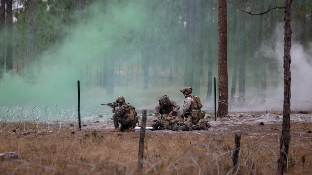 U.S. Marines with 3rd Battalion, 2nd Marine Regiment, 24th Marine Expeditionary Unit, simulate a breach during a live-fire range on Marine Corps Base Camp Lejeune, North Carolina, Jan. 14, 2026. The range increases Marines lethality through live fire movements and combat scenarios. The 24th MEU is a Marine Air Ground Task Force ready to answer our Nation's call in any clime and place. (U.S. Marine Corps photo by Lance Cpl. Brian Bolin Jr.)