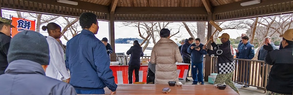 YOKOSUKA, Japan (Jan. 28, 2026) — Personnel assigned to U.S. Naval Hospital Yokosuka take turns using a kine (mallet) to pound rice during a traditional mochitsuki ceremony at the hospital. The Japanese Fellows organized the event to highlight cultural partnership and collaboration between U.S. and Japanese medical professionals. The Japanese Fellowship Program is a yearlong graduate medical education program that has trained Japanese physicians at USNH Yokosuka since 1952. (U.S. Navy photo by Daniel Taylor/USNMRTC Yokosuka Public Affairs)