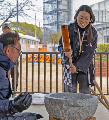 YOKOSUKA, Japan (Jan. 28, 2026) — Personnel assigned to U.S. Naval Hospital Yokosuka take turns using a kine (mallet) to pound rice during a traditional mochitsuki ceremony at the hospital. The Japanese Fellows organized the event to highlight cultural partnership and collaboration between U.S. and Japanese medical professionals. The Japanese Fellowship Program is a yearlong graduate medical education program that has trained Japanese physicians at USNH Yokosuka since 1952. (U.S. Navy photo by Daniel Taylor/USNMRTC Yokosuka Public Affairs)