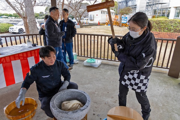 YOKOSUKA, Japan (Jan. 28, 2026) — Dr. Reika Matsushita, a Japanese Fellow assigned to U.S. Naval Hospital Yokosuka, uses a kine (mallet) to pound rice during a traditional mochitsuki ceremony at the hospital. The Japanese Fellows organized the event to highlight cultural partnership and collaboration between U.S. and Japanese medical professionals. The Japanese Fellowship Program is a yearlong graduate medical education program that has trained Japanese physicians at USNH Yokosuka since 1952. (U.S. Navy photo by Daniel Taylor/USNMRTC Yokosuka Public Affairs)
