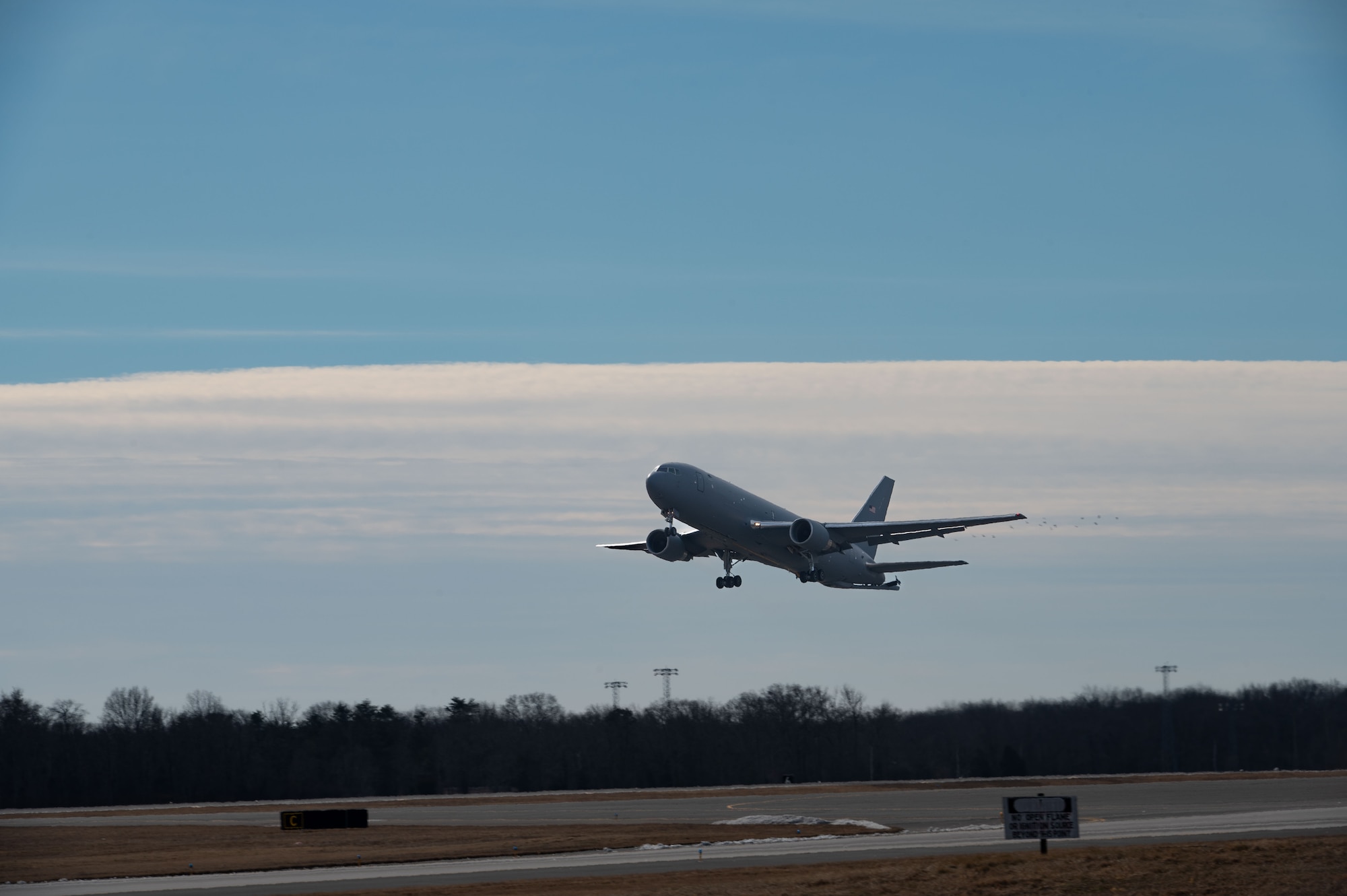 A U.S. Air Force KC-46A Pegasus aircraft assigned to the 305th Air Mobility Wing takes flight at Joint Base McGuire-Dix-Lakehurst, N.J., Jan. 24, 2026. Multiple aircraft at JB MDL were repositioned from the local area preceding Winter Storm Fern to ensure they can provide continued mission support. (U.S. Air Force photo by Airman 1st Class Haeleigh Bayle)