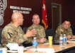 Col. Deon Maxwell, left, commander of U.S. Army Medical Logistics Command, briefs leadership from U.S. Army Communications-Electronics Command at Fort Detrick, Md. During the Jan. 29 workforce optimization brief, AMLC leaders provided Maj. Gen. James D. Turinetti IV, center, commanding general of CECOM, and CECOM Command Sgt. Maj. Jay High with a deep dive into key transformation initiatives.