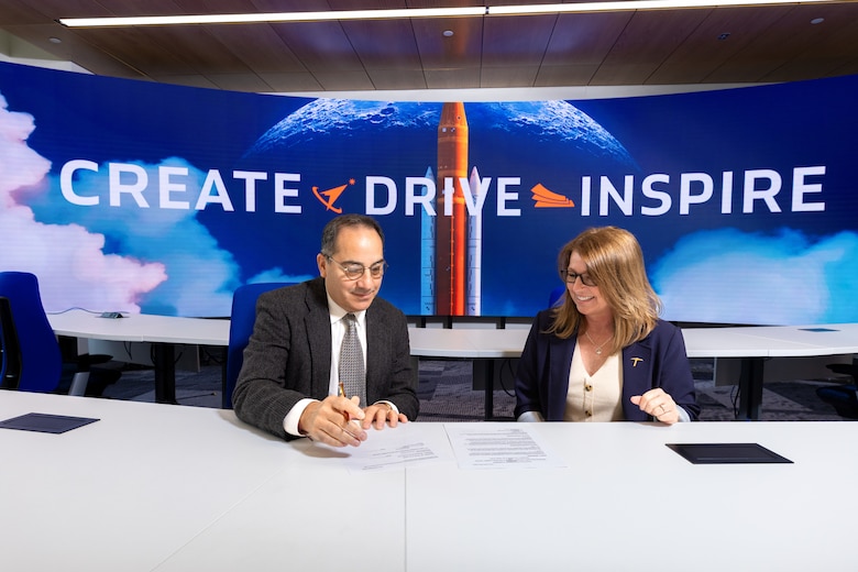 Mr. Benito Perez, research engineer at ERDC’s Construction Engineering Research Lab (CERL) and Dr. Shery Welsh, executive director of the University of Texas at El Paso Aerospace Center, sign the Educational Partnership Agreement.