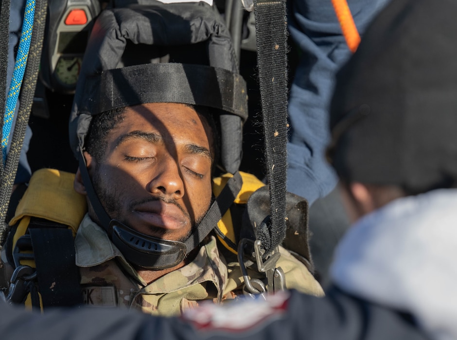 U.S. Air Force Airman 1st Class Timothy Mack, 97th Civil Engineer Squadron water and fuel systems maintenance journeyman, gets lifted out of a confined space at Altus Air Force Base (AFB), Oklahoma, Jan. 21, 2026. During the confined space response training, Mack was secured to a stretcher and lifted out of the confined space by the Altus AFB Fire Department. (U.S. Air Force photo by Airman 1st Class Emma Wright)