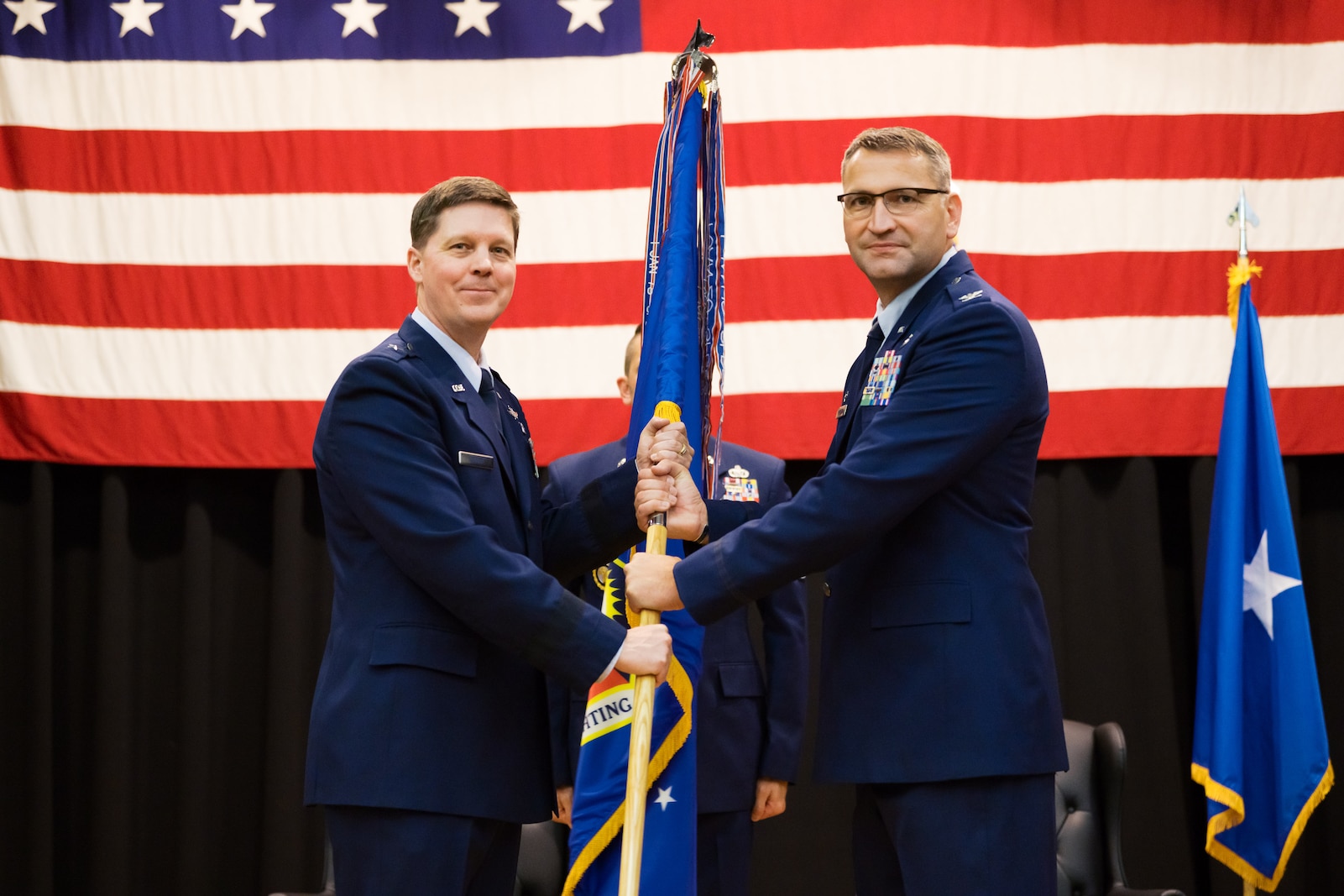 Col. Joseph Deeds assumes command of the 184th Wing, Kansas Air National Guard, from Col. David Hewlett during a change of command ceremony held at McConnell Air Force Base on Sept. 6, 2025.