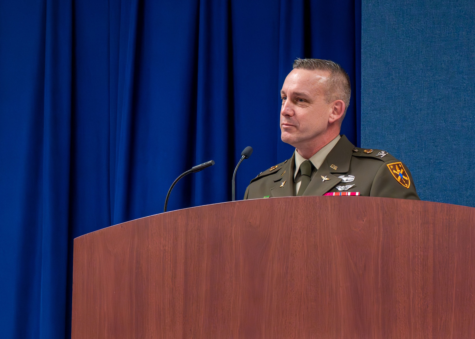 U.S. Army Col. Kevin McHugh, Warrant Officer Career College commandant, delivers remarks during a transfer of service ceremony for U.S. Air Force Chief Warrant Officer 5, Jason Godwin, Warrant Officer Training School advisor to the commandant, at Maxwell Air Force Base,
Alabama, Jan. 30, 2026. McHugh’s presence highlighted the collaborative effort between services to integrate technical leadership into the modern Air Force structure. (U.S. Air Force photo by Airman 1st Class Nelvis Sera)