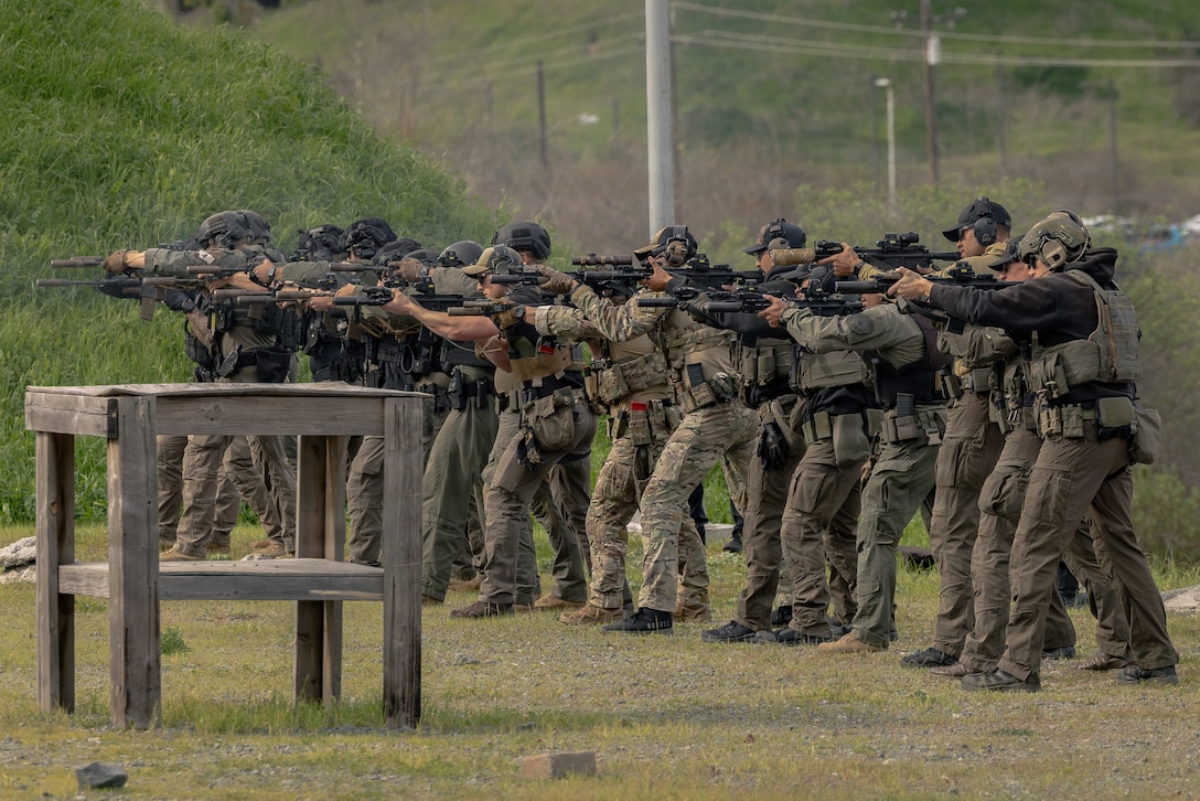 U.S. Marines with the Special Reaction Team, police officers with the San Diego County Sheriff’s Department Special Weapons and Tactics team, the Escondido Police Department SWAT, special agents with the United States Secret Service Counter Assault Tactical Team, and the Naval Criminal Investigative Service Regional Enforcement Action Capabilities Team participate in an integrated joint training exercise at Marine Corps Base Camp Pendleton, Calif., Jan. 28, 2026. The exercise focuses on enhancing interagency coordination by familiarizing participants with each team’s standard operating procedures and includes practical application drills simulating real-world scenarios to improve coordination and operational effectiveness among participating agencies. (U.S. Marine Corps photo by Sgt. Edgar Rafael).
