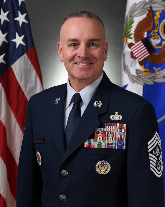 A military member poses for a portrait.