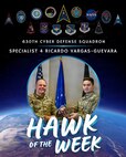 U.S. Space Force Col. James T. Horne III, left, Space Launch Delta 30 commander, presents Vandenberg’s Hawk of the Week Award to Specialist 4 Ricardo Vargas-Guevara, right, 630th Cyber Defense Squadron cyber defense operator, during a weekly installation leadership meeting.