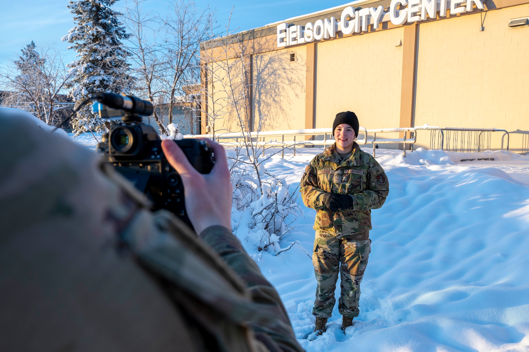 U.S. Air Force Airman 1st Class Mary Murray, 354th FW public affairs journeyman, is filmed for a video at Eielson Air Force Base, Nov. 24, 2025.