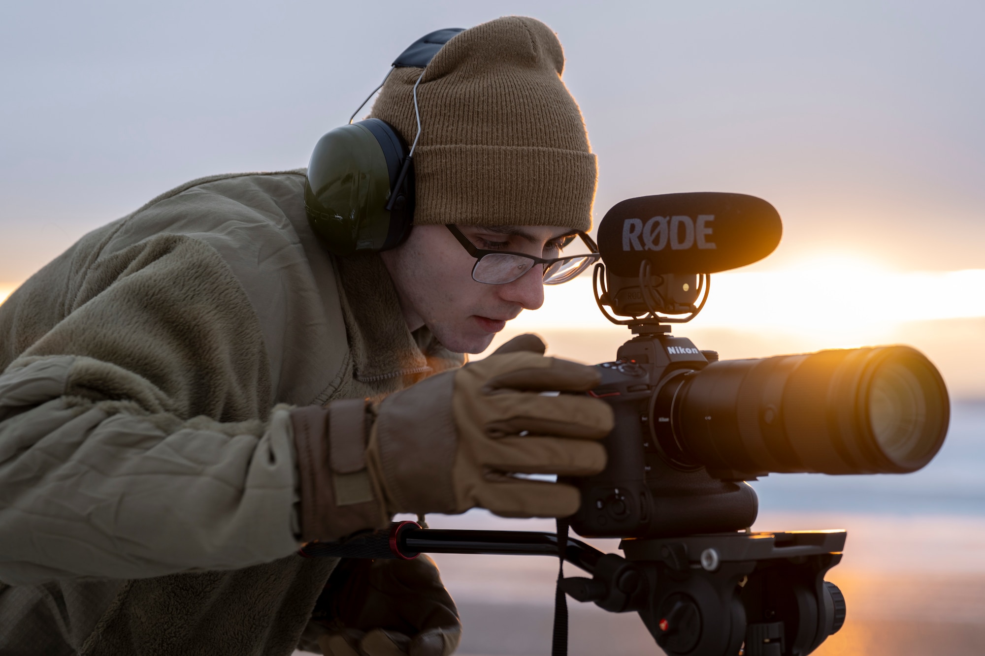 U.S. Air Force Senior Airman Colin Perkins, 354th Fighter Wing Public Affairs journeyman, records a video at Eielson Air Force Base, Jan. 15, 2026.