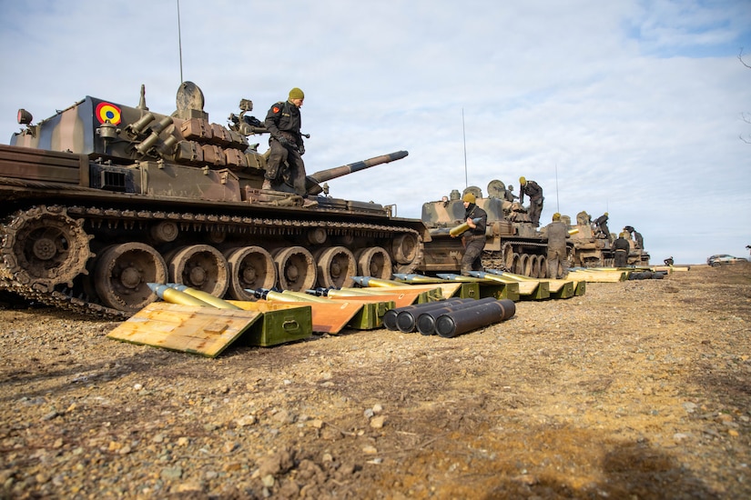 Romanian land force member assigned to the 284th Armored Battalion prepare ammunition before heading onto the range on Smârdan Training Area, Romania, Feb. 2, 2026.  Through realistic, combined training, U.S. and Romanian Land Forces shared tactical knowledge and enhanced combat readiness. The joint live-fire exercise contributed directly to NATO’s collective defense posture and reinforced security in the Black Sea region.  (U.S. Army photo by Sgt. Adel Pacheco Alvarez)