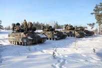 U.S. Army Soldiers assigned to 2nd Platoon, Chosen Company, 1st Battalion, 12th Cavalry Regiment, 3rd Armored Brigade Combat Team, stage their Bradley Fighting Vehicles in support of Unified Partners '26, Jan. 17, 2026 on Camp Taurus Training Area, Pabradė, Lithuania. Unified Partners '26 continued to strengthen the enduring partnership between the U.S. and Lithuania, reaffirming a shared commitment to collective defense, regional security, and the strength of the NATO Alliance. (U.S. Army photo by Sgt. Asher Atkinson)